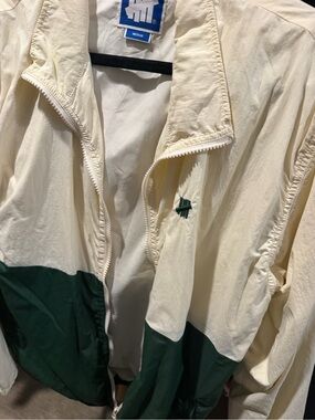 Undefeated Cream Jacket with Blue Logo Patch